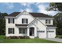 Elegant new construction home boasts white brick, black shutters, and a two-car garage at 74 Alex Farm Ct # 22, Zebulon, NC 27597