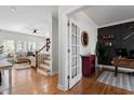 Inviting office space featuring hardwood floors, French doors, and modern decor at 101 Weatherly Pl, Cary, NC 27518