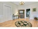 Beautiful foyer with hardwood floors, fireplace and charming decor at 102 Whitaker St, Franklinton, NC 27525