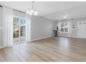 Spacious living room with hardwood floors, lots of natural light and neutral paint at 200 Indian Branch Dr, Morrisville, NC 27560