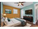 Cozy main bedroom featuring a comfortable bed, stylish furniture, and ample natural light at 902 Long Ave, Garner, NC 27529