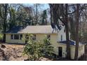 Attractive home with mature trees offering shade, showcasing a well-kept exterior at 123 Barclay Rd, Chapel Hill, NC 27516