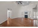Spacious living room features fireplace, hardwood floors, and abundant natural light at 2505 Egypt Mountain Rd, Kittrell, NC 27544