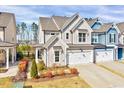 Beautifully landscaped home with a two-car garage and welcoming front exterior at 3162 Retama Run # 231, Apex, NC 27562