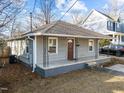 Beautiful one-story home with a cozy front porch perfect for relaxing and enjoying the outdoors at 805 N Elizabeth St St, Durham, NC 27701