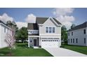 Home exterior with a two-car garage and attractive landscaping at 239 Meadowbark Bnd # 27, Garner, NC 27529