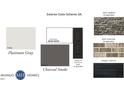 Exterior color scheme featuring platinum gray siding, charcoal smoke accents, and black shutters at 243 Meadowbark Bnd # 28, Garner, NC 27529