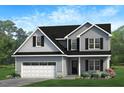 Charming two-story home featuring a two-car garage and welcoming front porch at 274 Yardley Dr, Smithfield, NC 27577