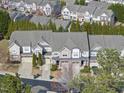 A high angle of a residential townhome community featuring neat landscaping at 2821 Casona Way, Raleigh, NC 27616