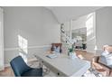 Bright office with large windows, neutral walls, and stylish furnishing at 315 Barthel Dr, Cary, NC 27513