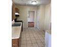 Neutral kitchen with a window and tile flooring at 333 Leasburg Rd, Roxboro, NC 27573