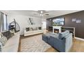 Comfortable living room features a fireplace and modern furnishings at 8710 Kenridge Ln, Fuquay Varina, NC 27526