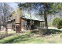 View of the property highlighting the home's exterior at 9511 Collins Creek Dr, Chapel Hill, NC 27516