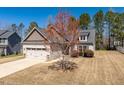 Charming home with a two-car garage, and traditional design elements at 96 Foxtail Ct, Clayton, NC 27520