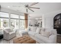 Inviting living room with lots of natural light, a neutral color scheme, and comfortable, modern furnishings at 1206 Linkwood Way, Fuquay Varina, NC 27526
