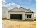 Charming single-Gathering home with an attached two-car garage in a suburban neighborhood at 135 N Keatts Winner Ct, Clayton, NC 27520
