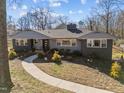 Charming home with a well-manicured lawn and inviting walkway leading to the front entrance at 1603 N Alston Ave, Durham, NC 27701