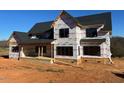 Exterior view of a new two-story home under construction at 171 Dairymont Dr, Pittsboro, NC 27312