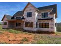 Exterior view of a new two-story home under construction at 171 Dairymont Dr, Pittsboro, NC 27312