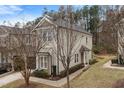 Beautiful end-unit townhome with well-maintained landscaping and a charming entrance at 200 Mariah Towns Way, Garner, NC 27529