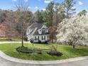 Beautiful two-story home with mature landscaping on a large corner lot at 2760 Clifton Ave, Creedmoor, NC 27522