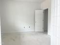 Bedroom with a white walls, trim, and door at 47 Tee Time Ter, Benson, NC 27504