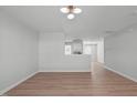 Bright, spacious living room with hard surface flooring and ample natural light at 5210 Blue Lagoon Ln, Raleigh, NC 27610