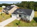 Charming one-story home with a two-car garage and new construction in a desirable neighborhood at 63 Tee Time Ter, Benson, NC 27504