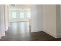 Bright and airy living room with hardwood floors and an abundance of natural light at 63 Tee Time Ter, Benson, NC 27504