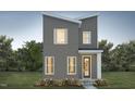 Modern gray two-story home with white window trim, minimalist design and fresh landscaping at 101 Parkland Dr, Pittsboro, NC 27312
