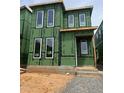 New construction home featuring large windows at 107 Parkland Dr, Pittsboro, NC 27312
