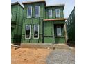 New construction home featuring large windows at 107 Parkland Dr, Pittsboro, NC 27312