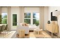 Bright living room showcasing modern decor, large windows, and stylish furnishings at 883 Pilot St # 48, Haw River, NC 27258