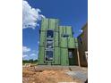 New construction with modern design featuring large windows and ZIP system sheathing at 95 Parkland Dr, Pittsboro, NC 27312