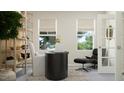 Stylish office space with natural light, modern furniture, and an organized bookshelf at 0 Hanover Way, Sanford, NC 27330