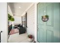 Inviting front porch with comfortable seating and charming decor details at 1516 Barn Door Dr, Apex, NC 27502