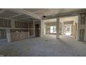 Spacious, unfinished living area featuring large windows for natural light at 1681 Pecan Drive # 22, Nashville, NC 27856