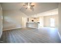Spacious living area with sleek flooring and open layout, ready for personalization and comfort at 400 S Eastwood Dr, Benson, NC 27504