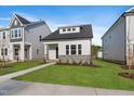 Charming single-Gathering home with manicured lawn and stone accents at 761 Portland Rose Dr, Knightdale, NC 27545