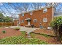 Spacious backyard featuring a patio area perfect for outdoor entertaining and relaxation at 317 Shadowbrook Dr, Burlington, NC 27215