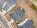 An aerial view shows rooftops and driveway in a neighborhood at 724 Red Arrow Drive Dr, Knightdale, NC 27545