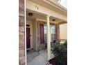 Inviting front porch featuring stone accents, a cozy seating area, and a well-maintained entrance at 78 Florence Dr, Clayton, NC 27527
