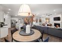 Open-concept living space seamlessly connects the kitchen, dining area, and living room, perfect for entertaining at 340 Bridle Brook Way, Fuquay Varina, NC 27526