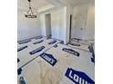 Hallway with hardwood flooring, neutral paint, and white trim at 60 Moonraker Dr, Spring Hope, NC 27882