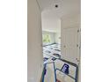 Living room with a view of a window, doorway, flooring, and white walls at 60 Moonraker Dr, Spring Hope, NC 27882