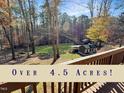 Expansive backyard featuring a charming shed and fenced-in area, perfect for outdoor activities at 10004 Liana Ln, Raleigh, NC 27613