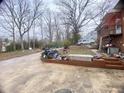 Backyard with hardscape and space for parking at 4308 Old Chapel Hill Rd Rd, Durham, NC 27707
