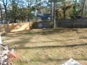 This backyard has a new fence and green space at 468 Dickens Dr, Raleigh, NC 27610