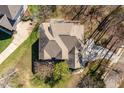 Birds-eye view of home showcasing roof, landscaping, and surrounding neighborhood at 101 Redfoot Run Rd, Chapel Hill, NC 27516