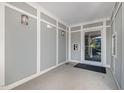 Clean, modern entryway with secure access and ample lighting at 201 Finsbury St # 201, Durham, NC 27703